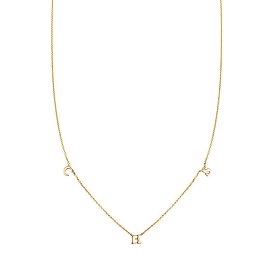 3-letter gold initial necklace, a chic choice for personalized accessorizing.