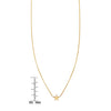 large gold star necklace with ruler
