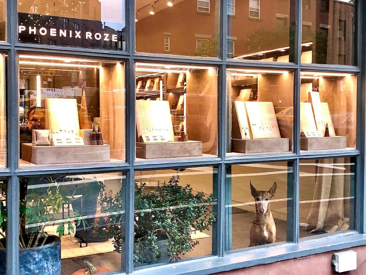 West Village NYC jewelry store - gold initial necklaces and custom designs displayed